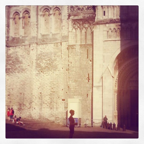 VIEW OF WOMAN WALKING ON WALL