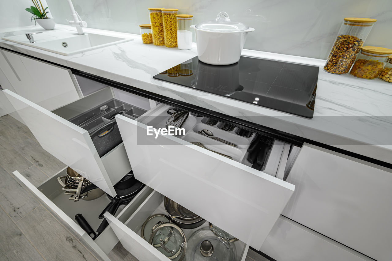 High angle view of kitchen utensils in drawer