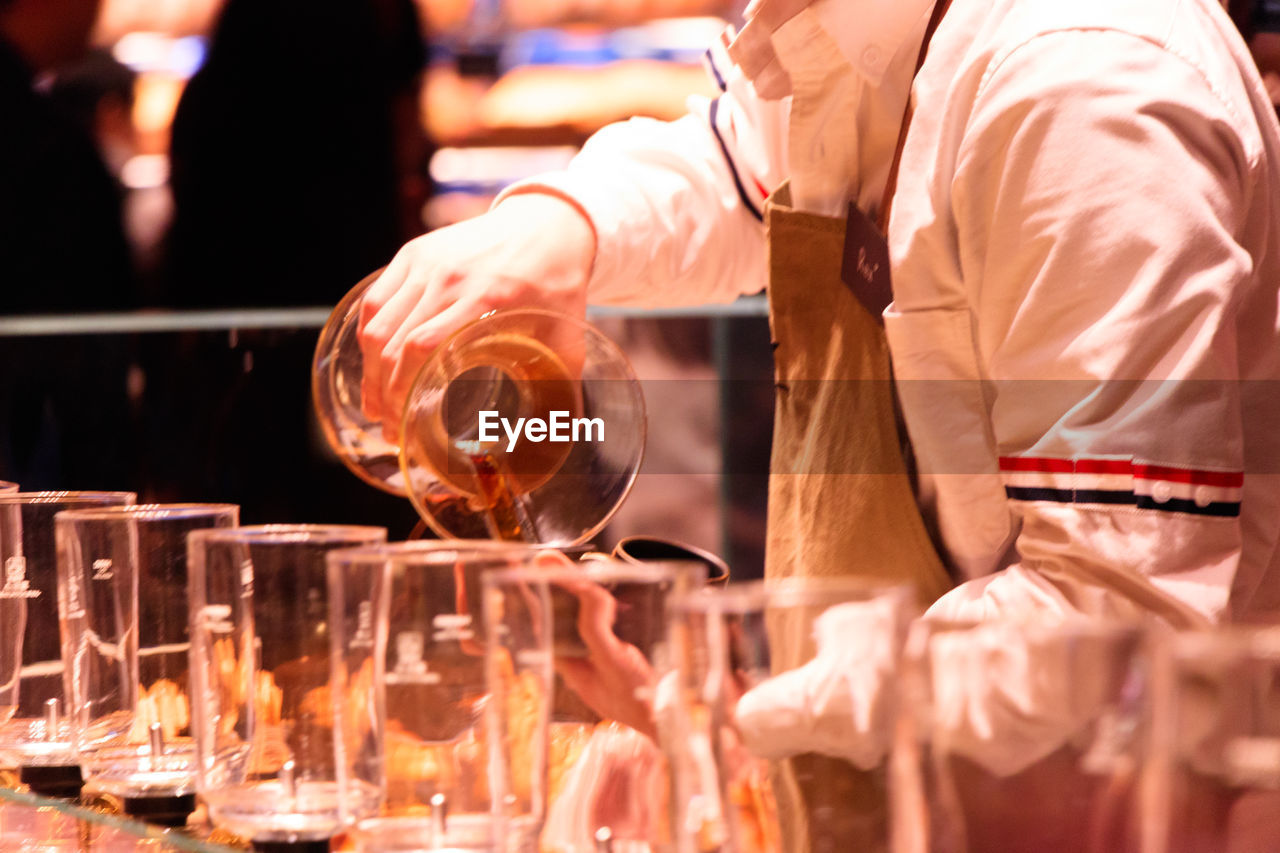 Close up of coffee being poured by a barista in starbucks reserve roastery shanghai