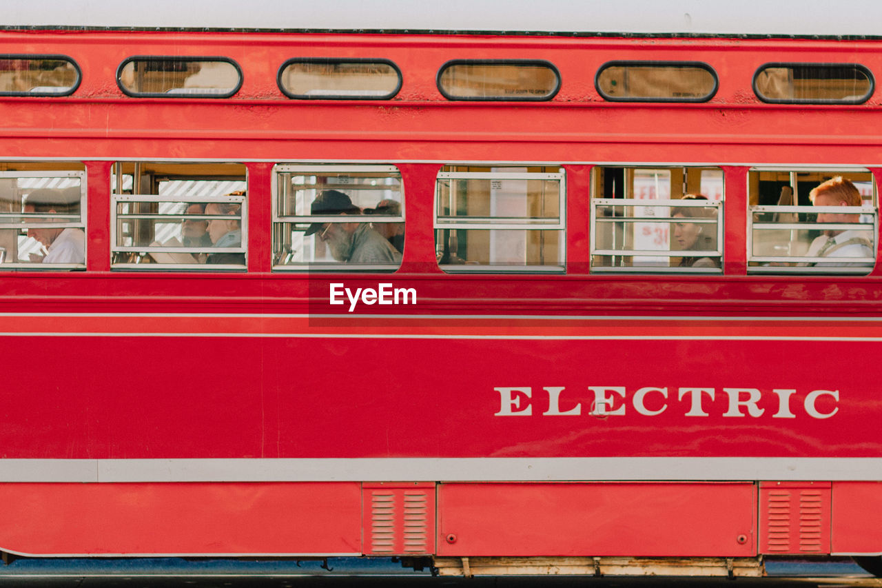 CLOSE-UP OF TRAIN AT RED BUS