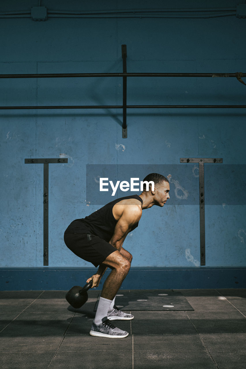 African american male athlete exercising in the gym