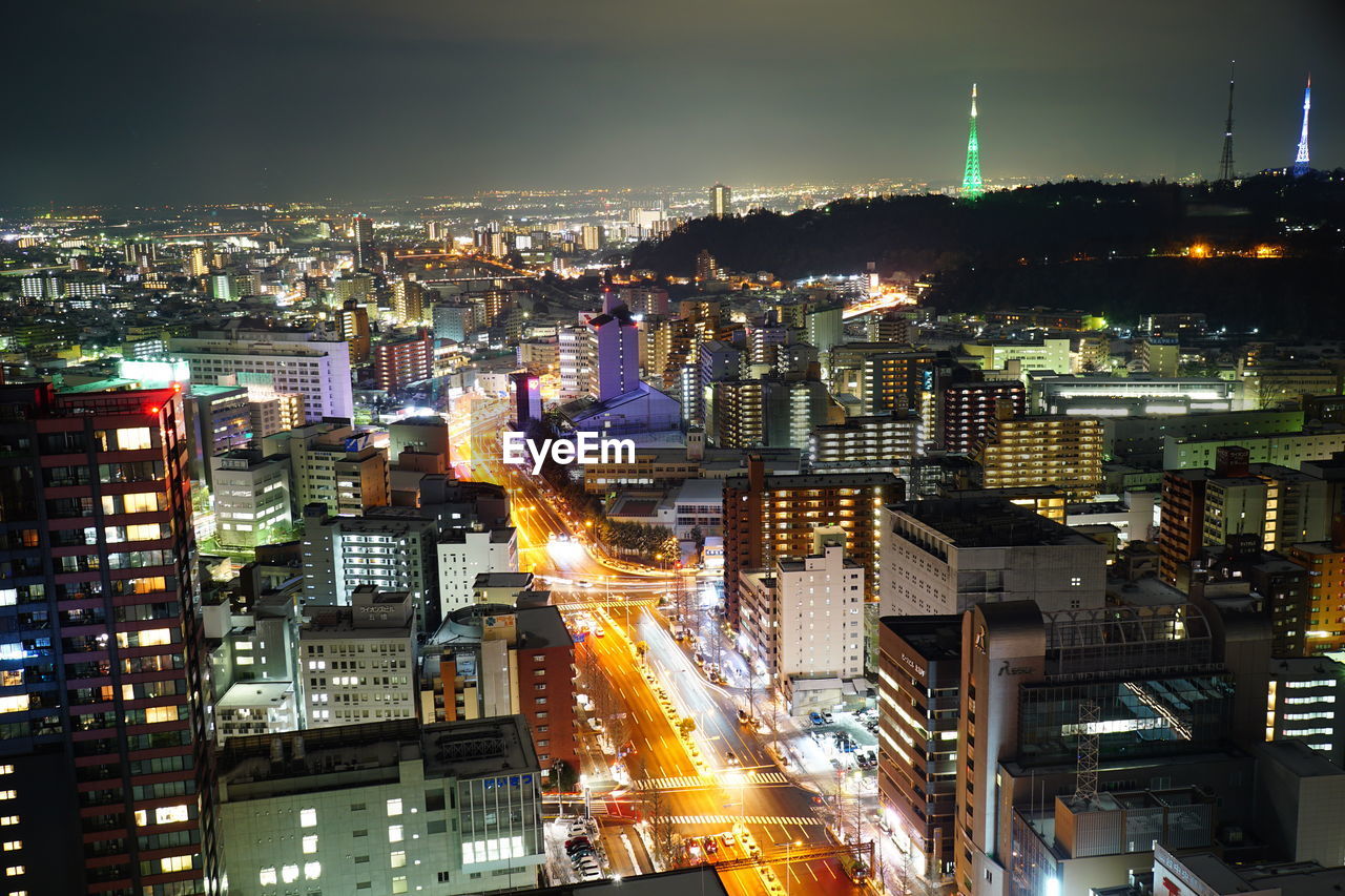 High angle view of illuminated cityscape at night