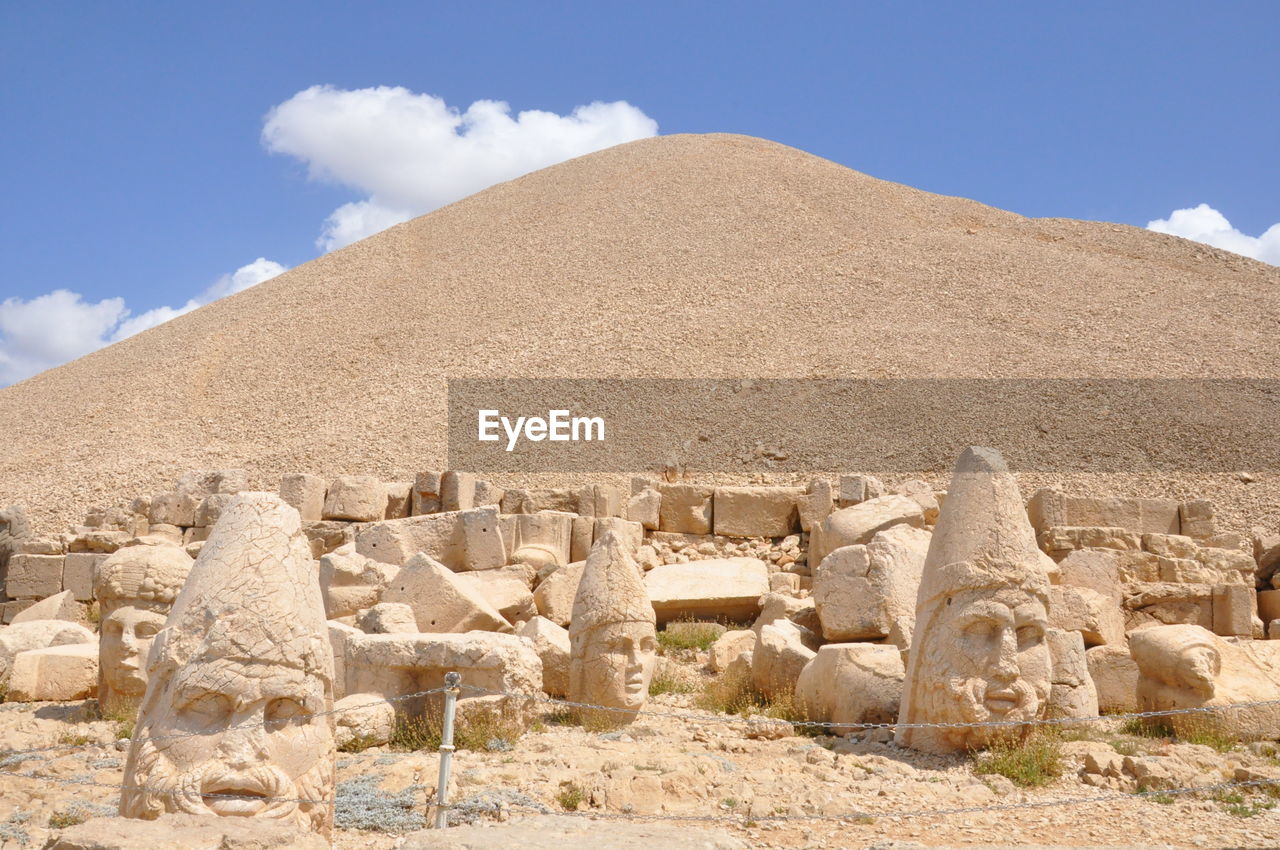 Built structure in desert against sky. nemrut