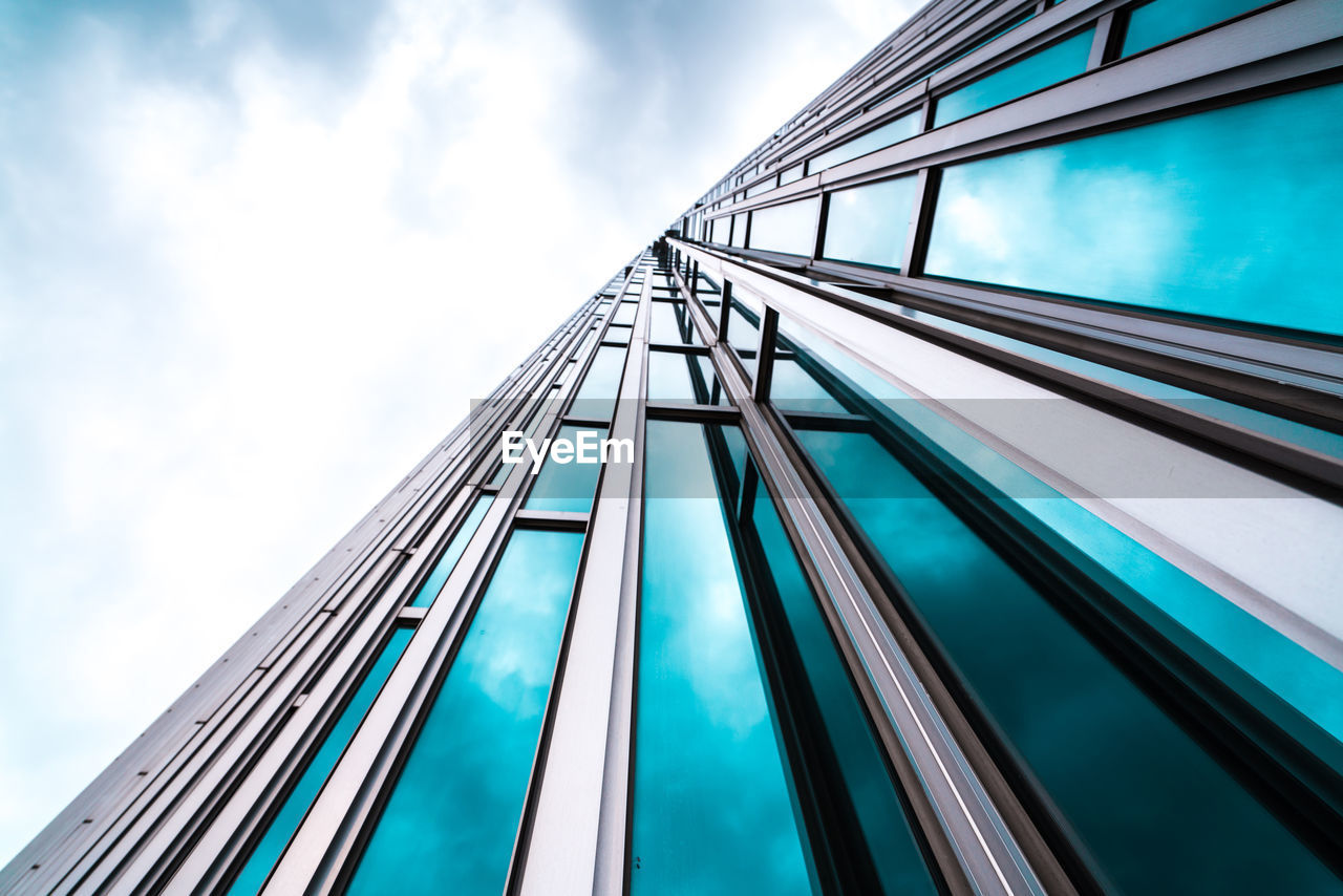 Low angle view of modern building against sky