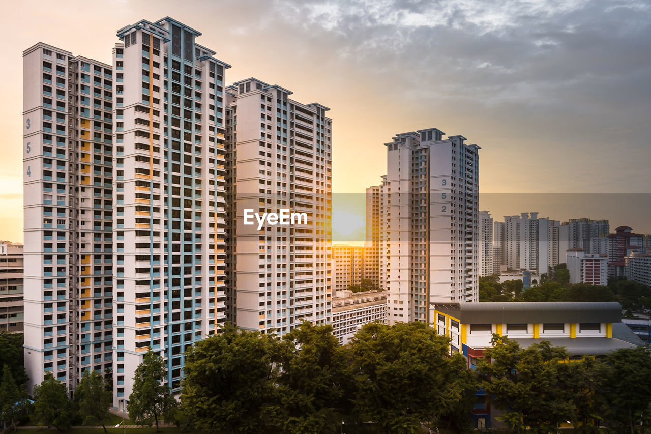 Modern buildings in city against sky