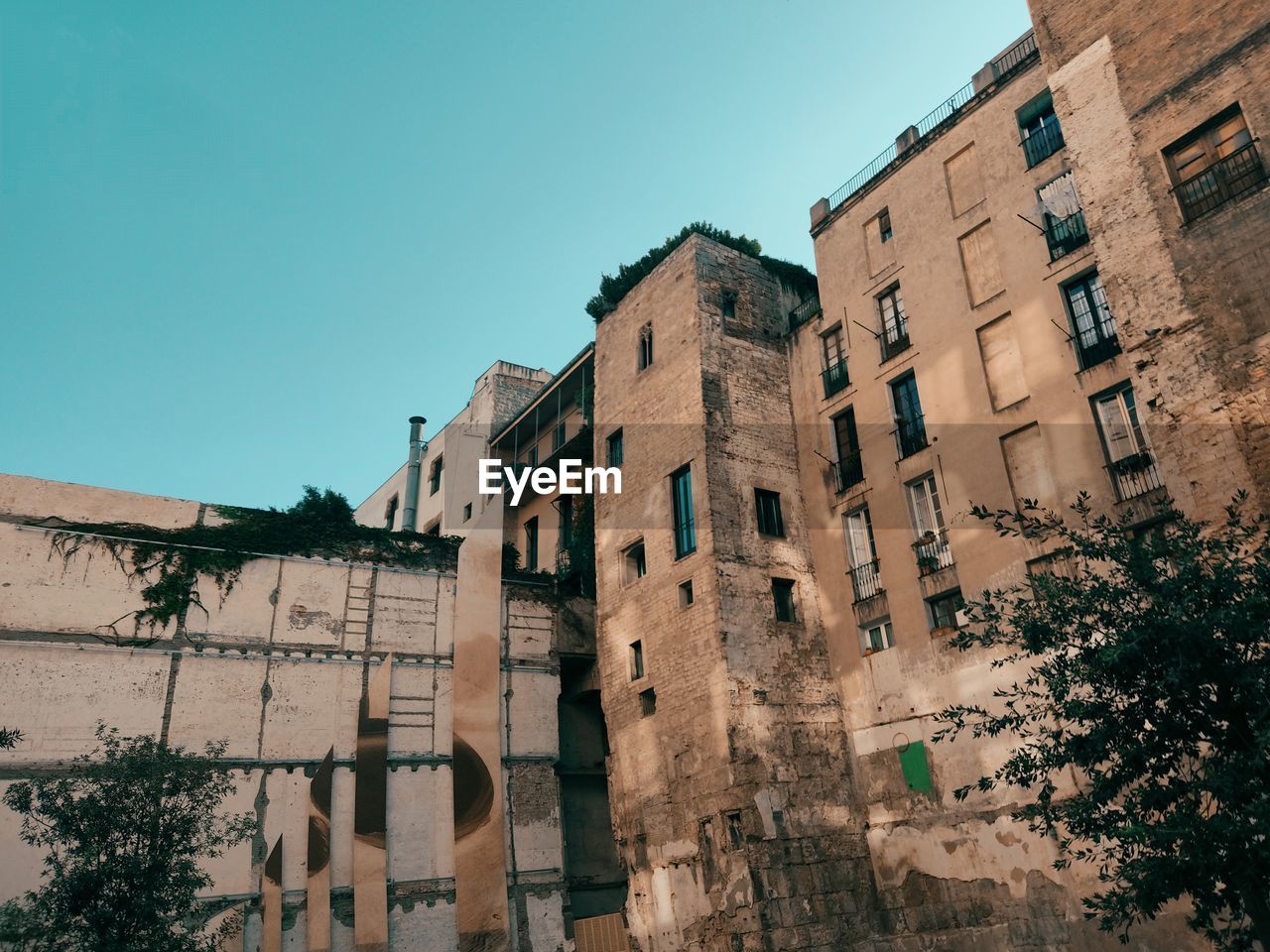 Low angle view of residential building against sky