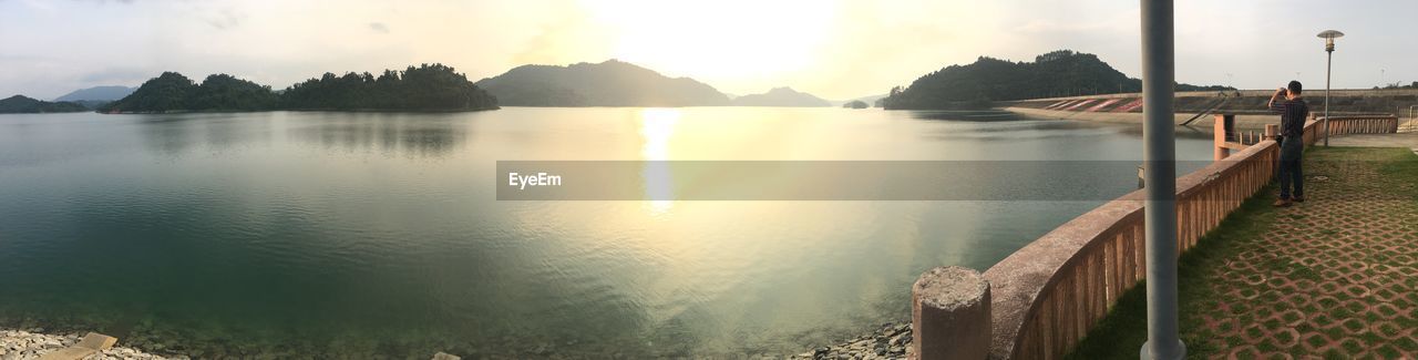 PANORAMIC SHOT OF LAKE AGAINST SKY