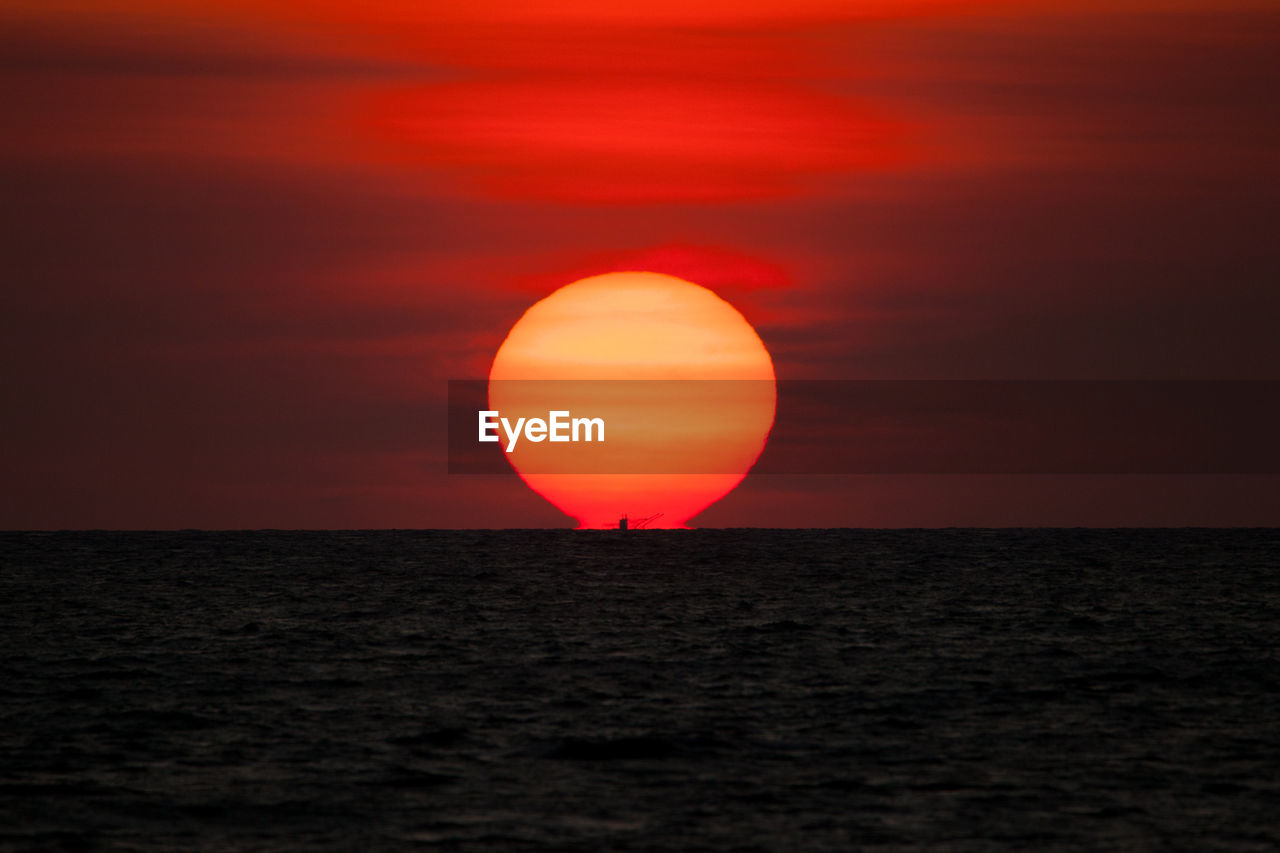 Scenic view of sunset over sea