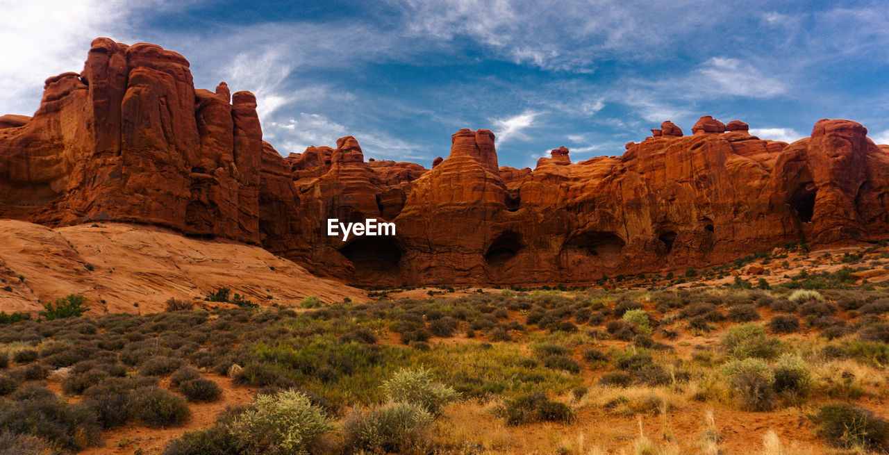 Rock formations on mountain against sky