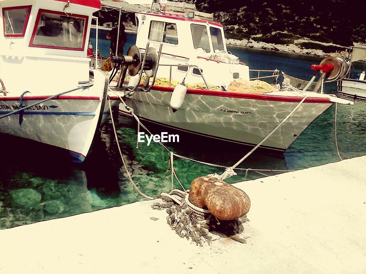 VIEW OF BOATS IN RIVER