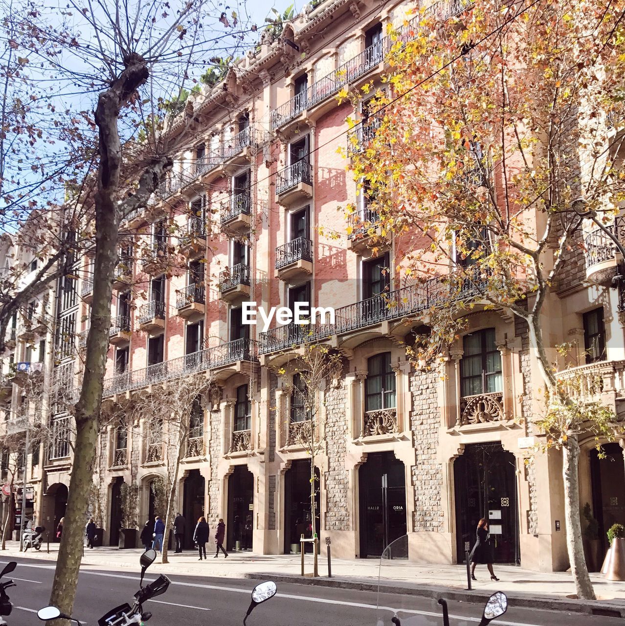 VIEW OF CITY STREET AMIDST BUILDINGS