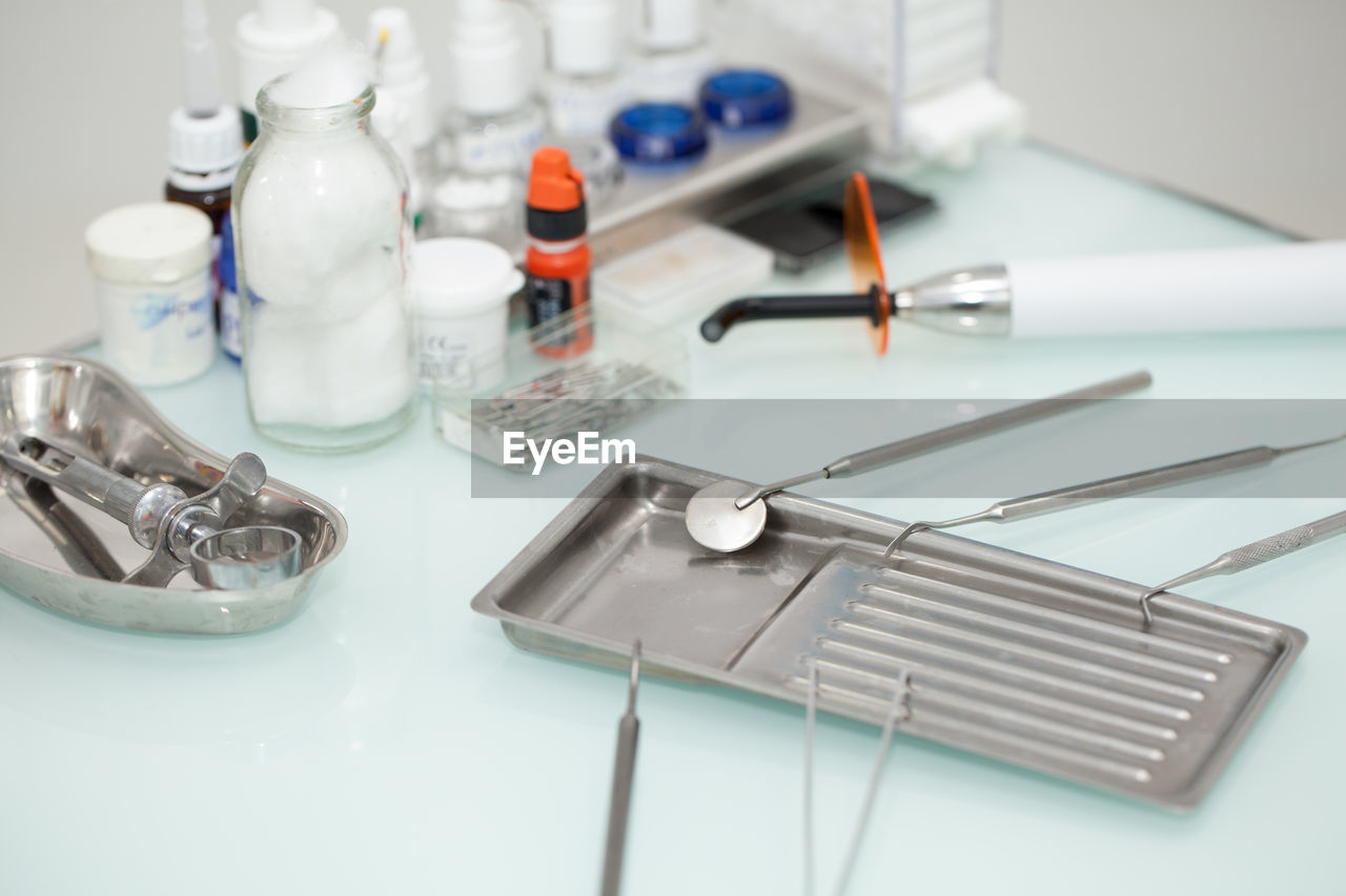 Close-up of dental equipment on table