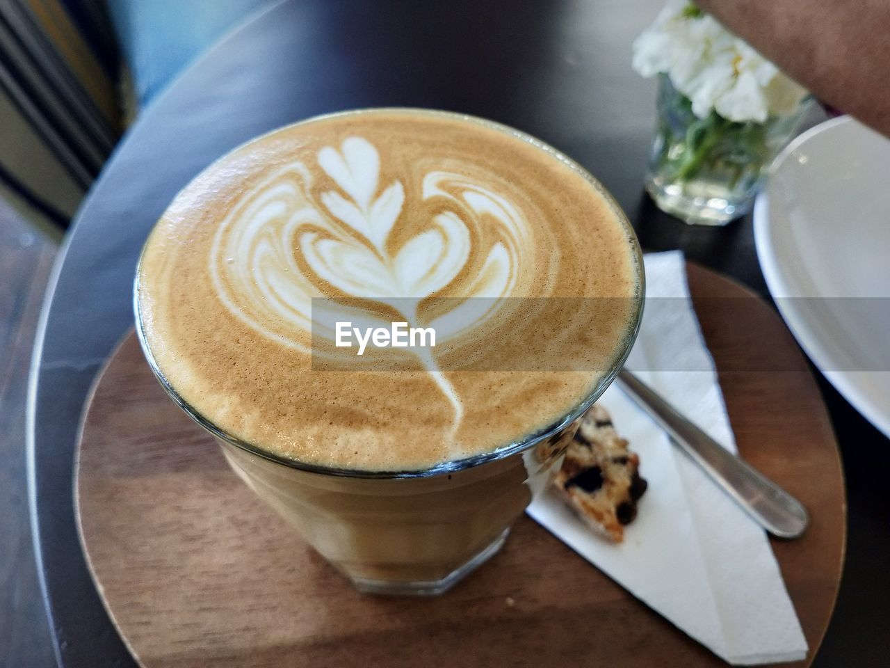 The concentration and softness of the coffee latte and the beauty of the latte art. coffee lover.