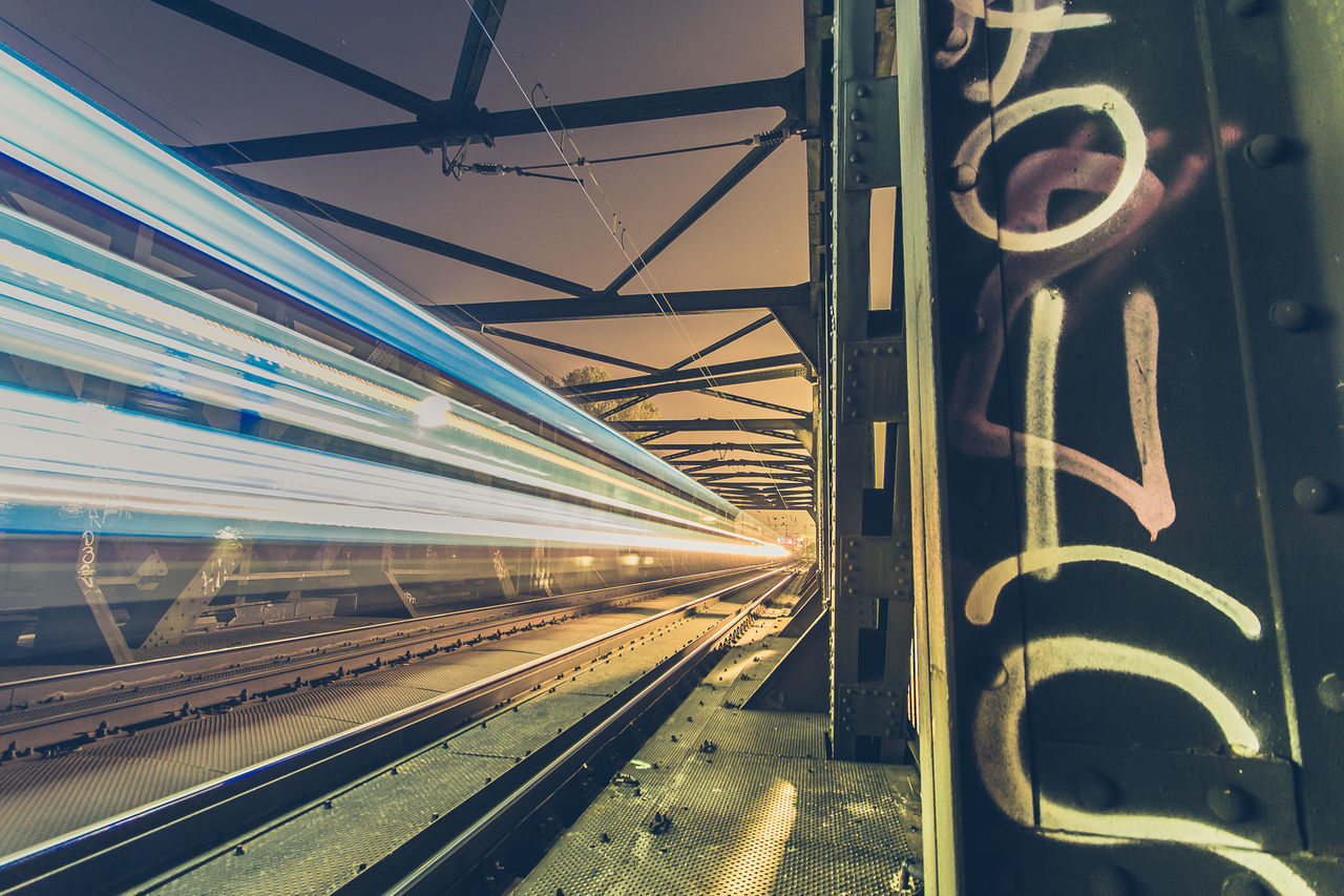 Train light trails at night