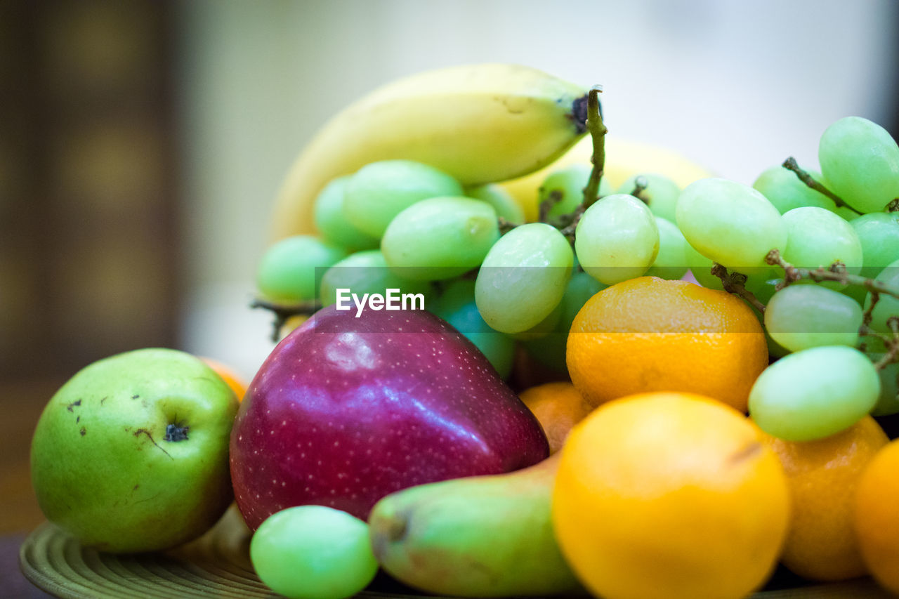 Close-up of fruits in plate