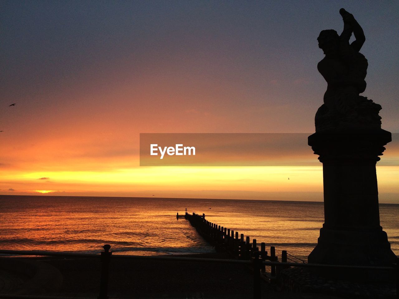 Scenic view of sea during sunset