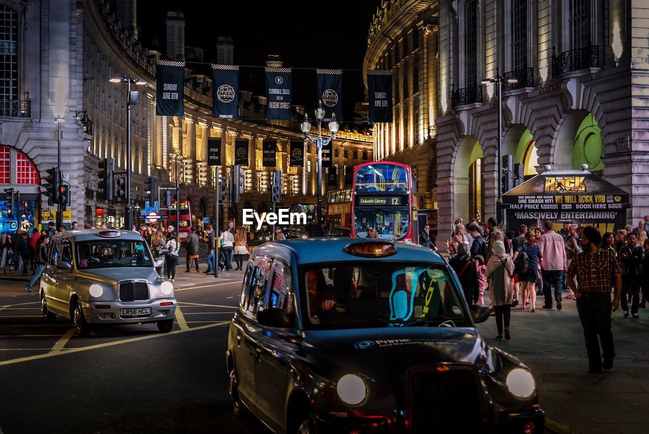 Traffic on city street at night