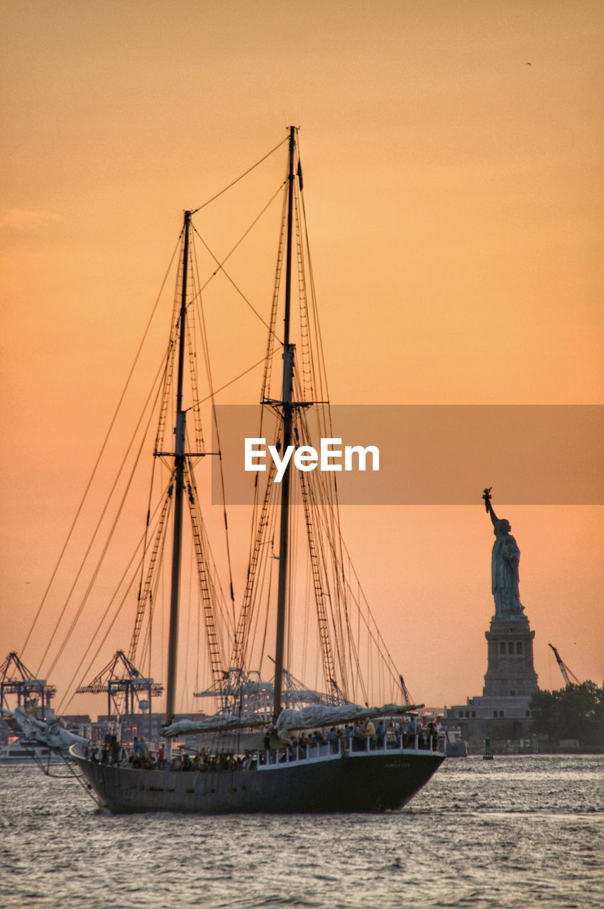 Ship in sea at sunset new york
