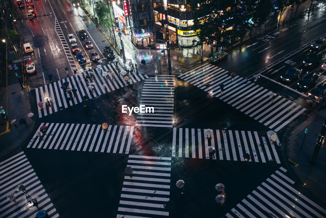 HIGH ANGLE VIEW OF ROAD SIGN ON STREET