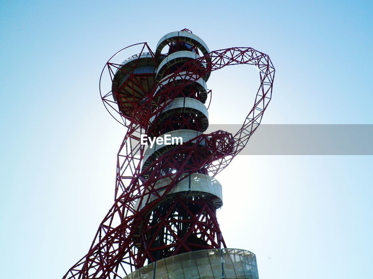 Low angle view of arcelormittal orbit against clear sky