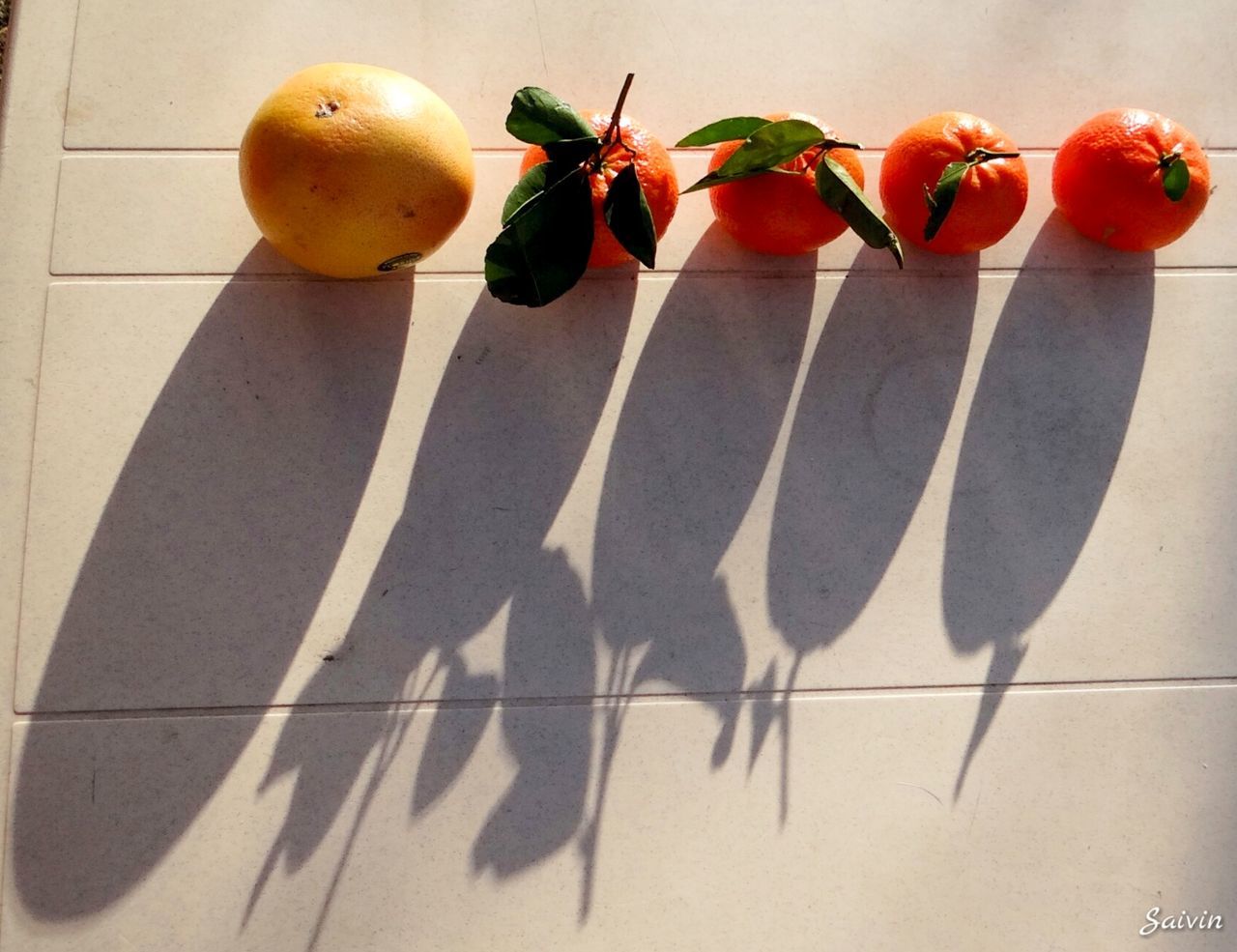 Close-up of orange fruits on table