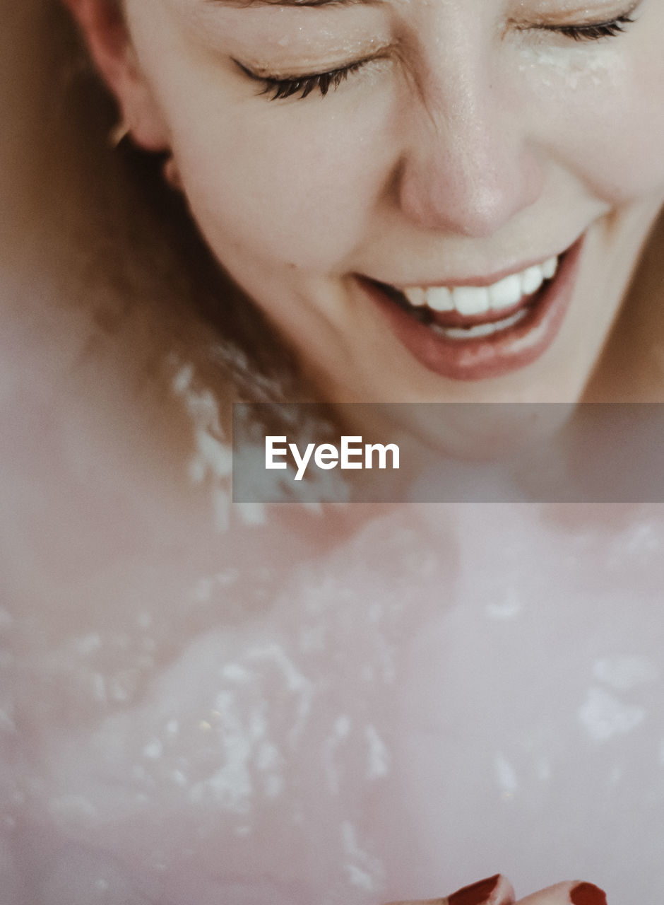 close-up of woman swimming in water