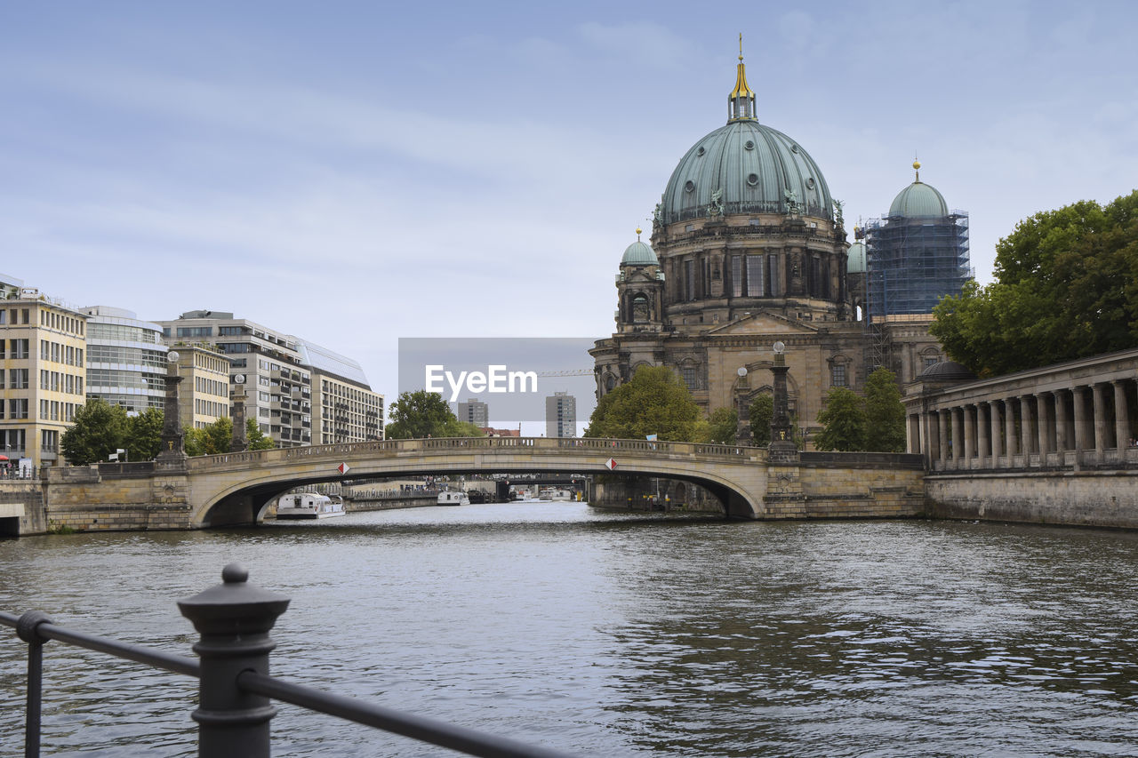 BRIDGE OVER RIVER IN CITY