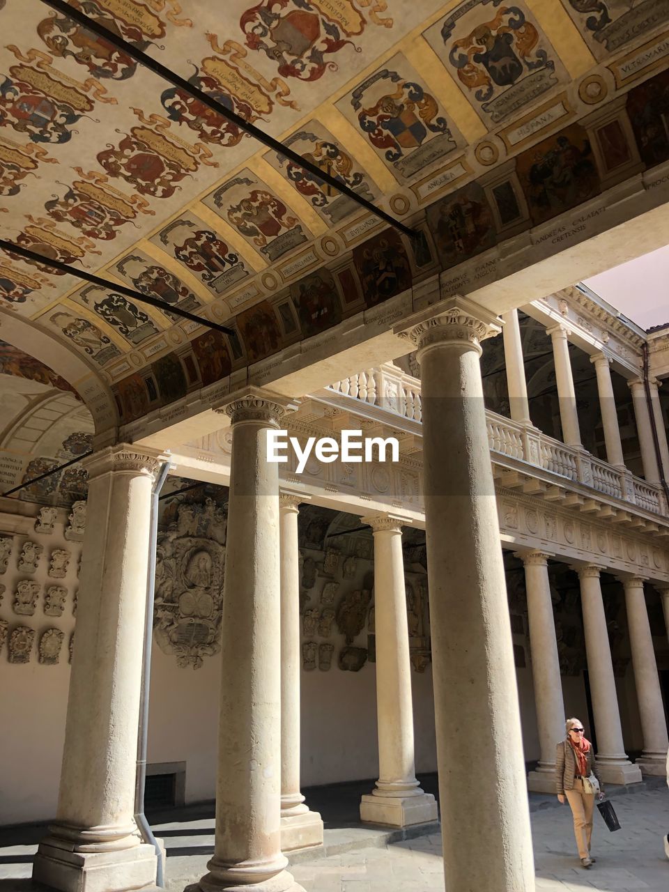 LOW ANGLE VIEW OF HISTORICAL BUILDING IN COLONNADE