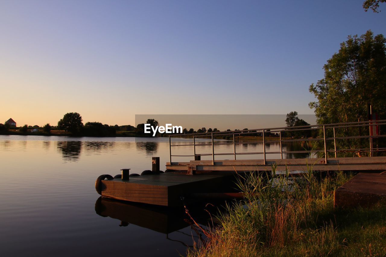 Scenic view of lake against clear sky