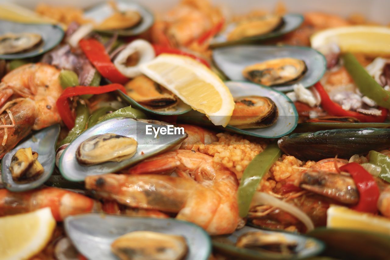 Close-up of seafood paella served on table