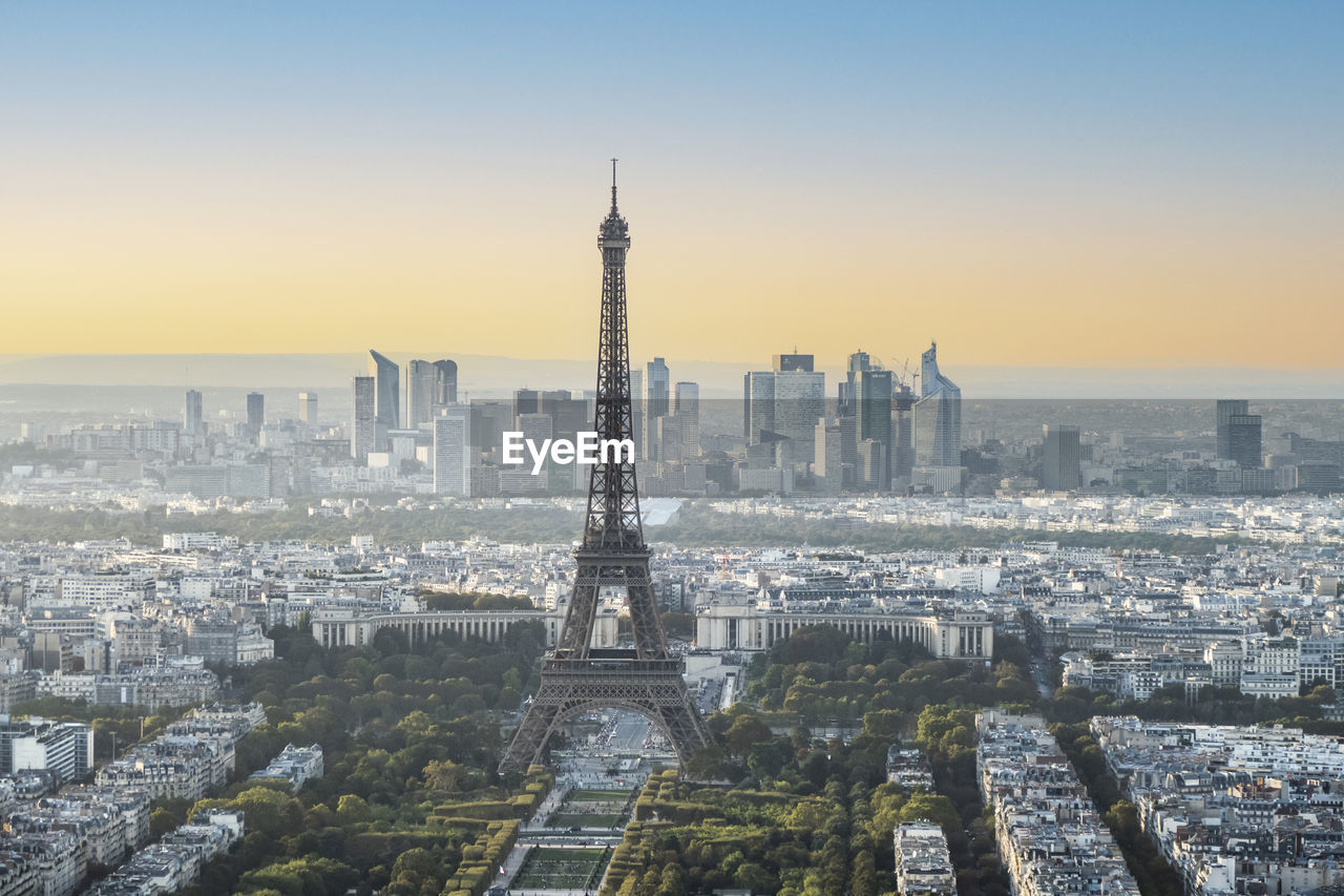 Aerial view of paris at sunset with the eiffel tower in background