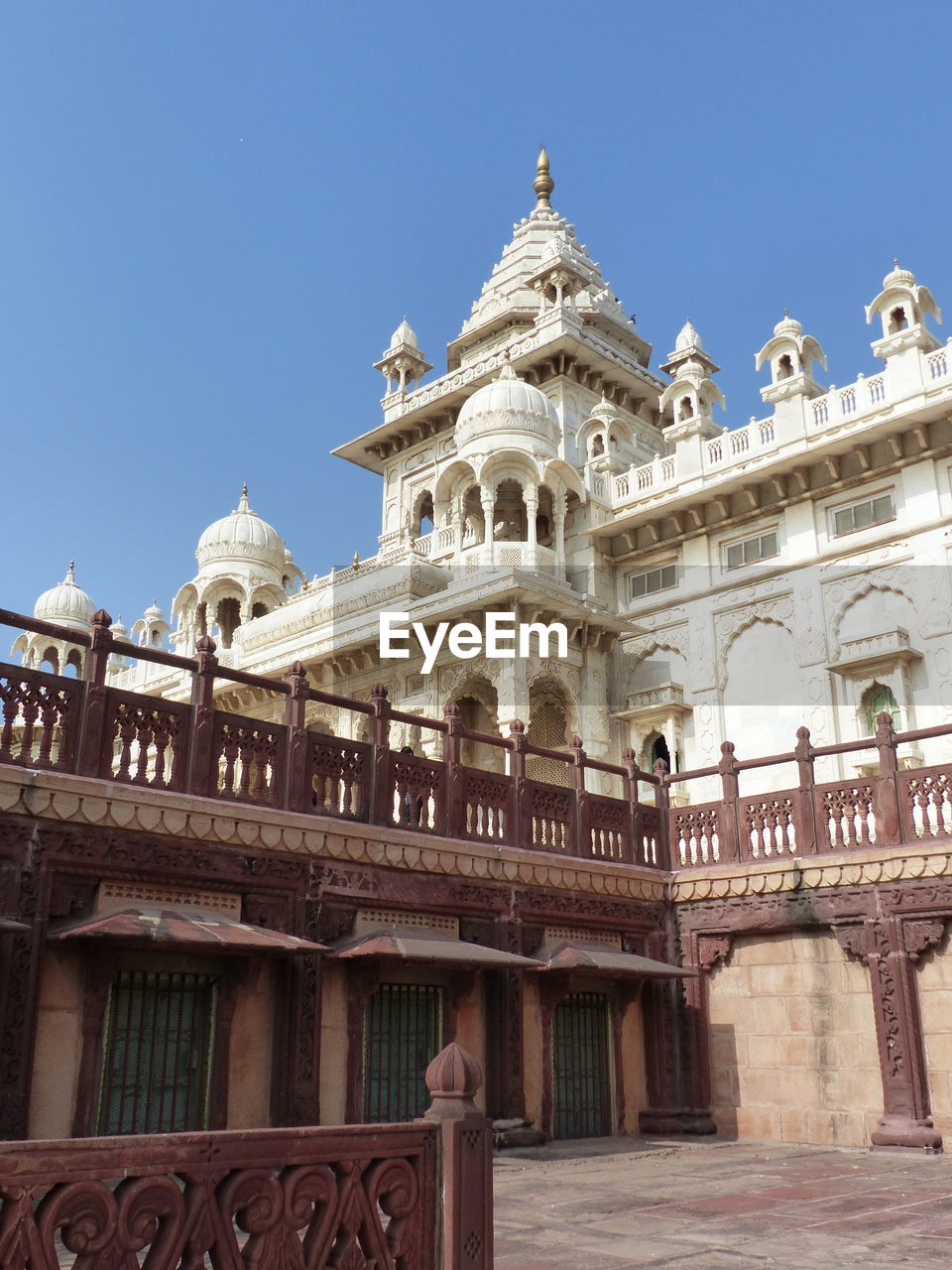 architecture, built structure, building exterior, low angle view, sky, travel destinations, landmark, clear sky, no people, blue, day, nature, travel, city, building, history, tower, the past, skyscraper, tourism, outdoors, religion, sunny, belief