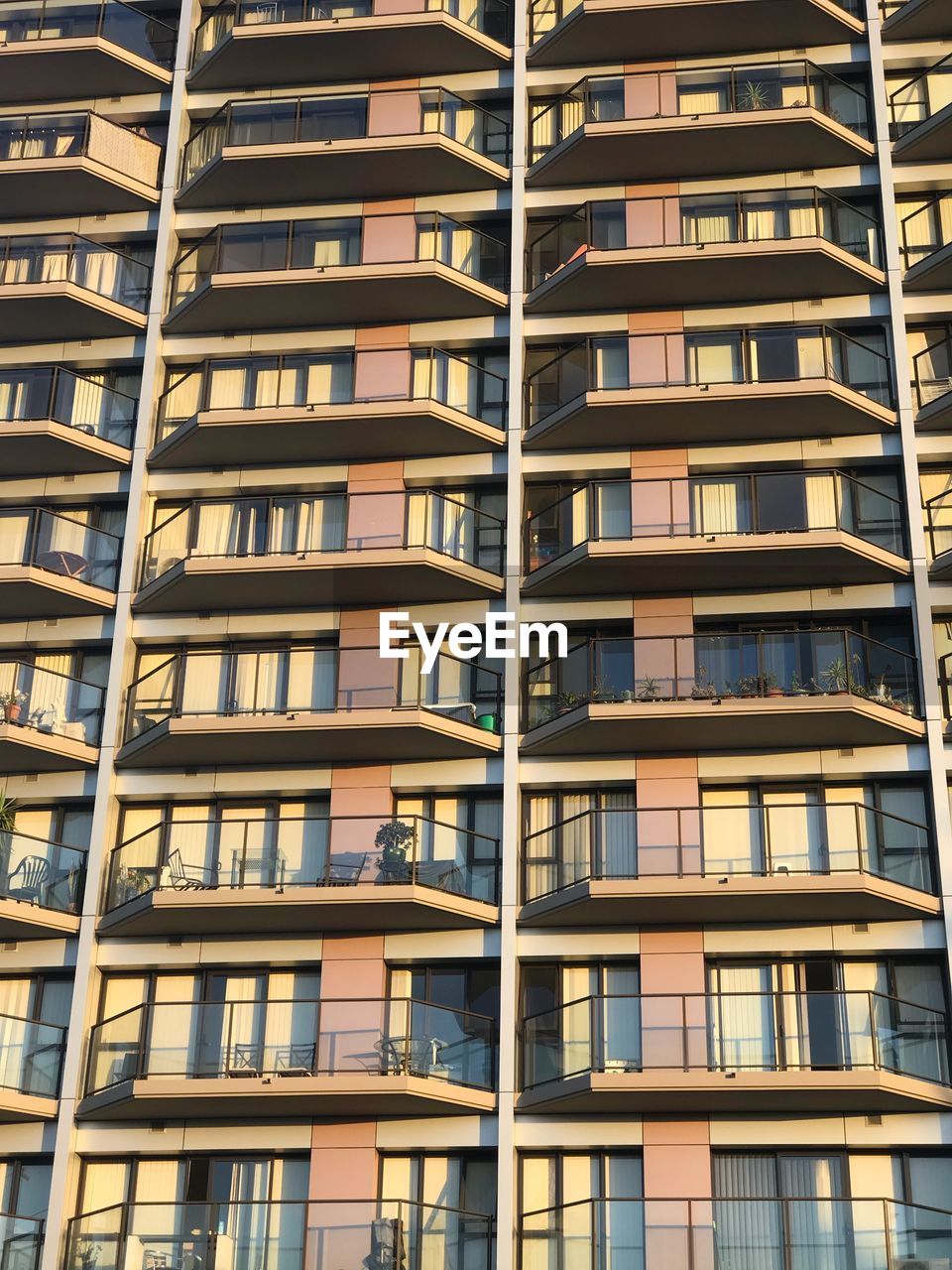 LOW ANGLE VIEW OF RESIDENTIAL BUILDINGS IN CITY