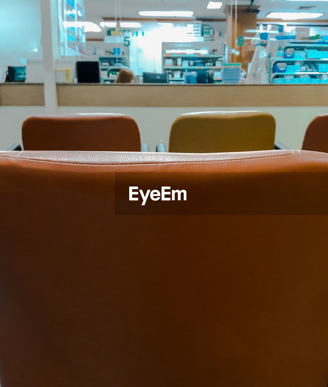 CLOSE-UP VIEW OF CHAIRS IN ROW