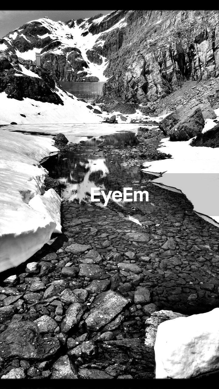 VIEW OF FROZEN LAKE