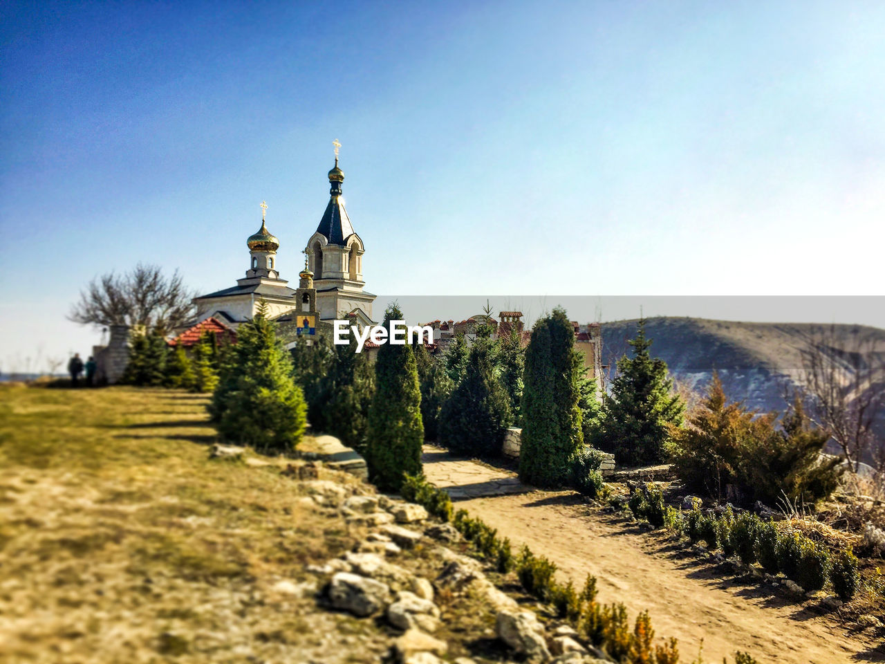 VIEW OF TEMPLE ON LANDSCAPE