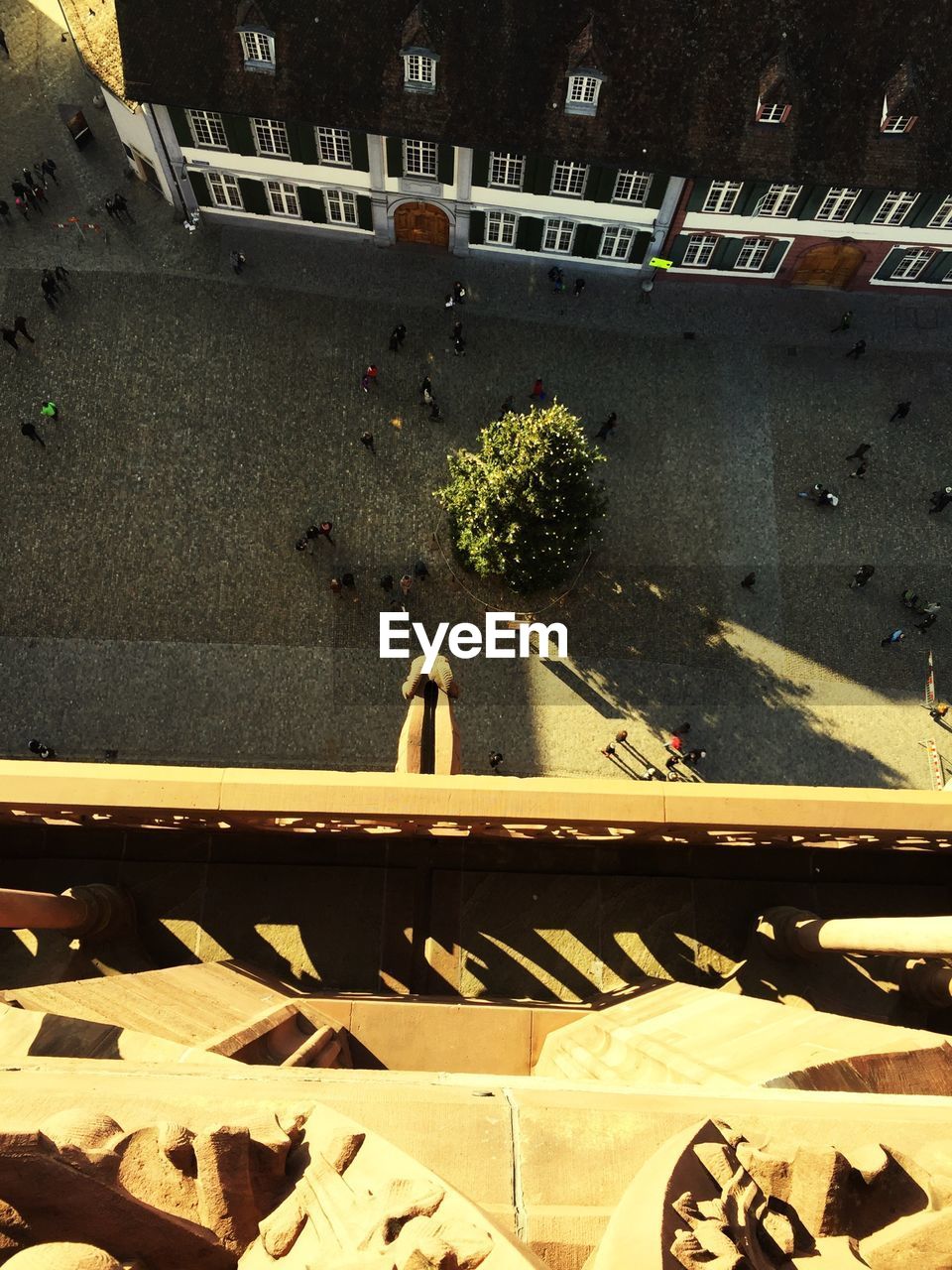 High angle view of buildings in city during sunny day