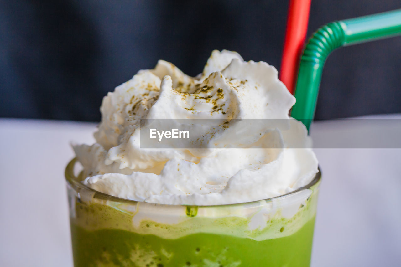 CLOSE-UP OF ICE CREAM IN PLATE