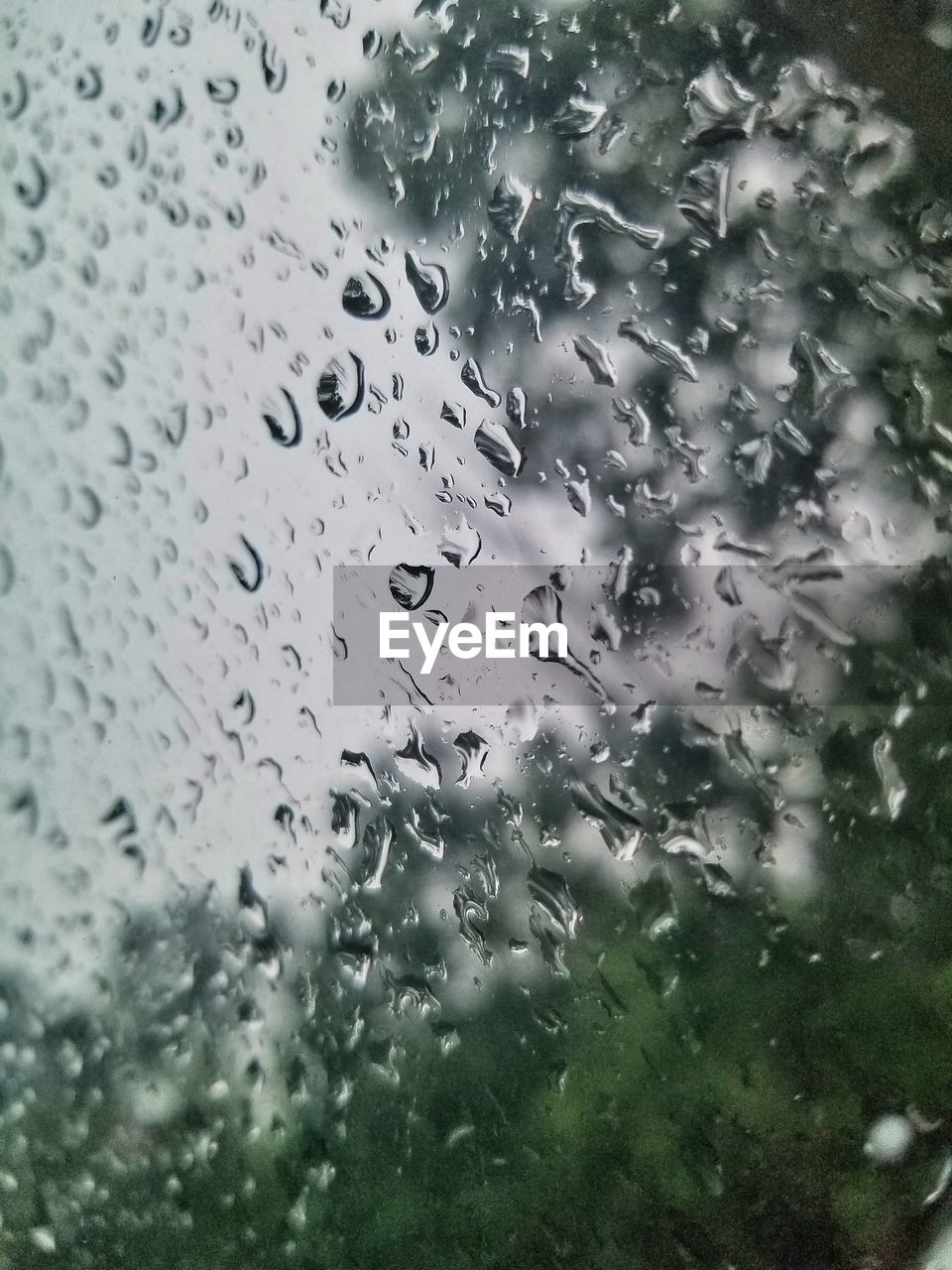 WATER DROPS ON GLASS WINDOW