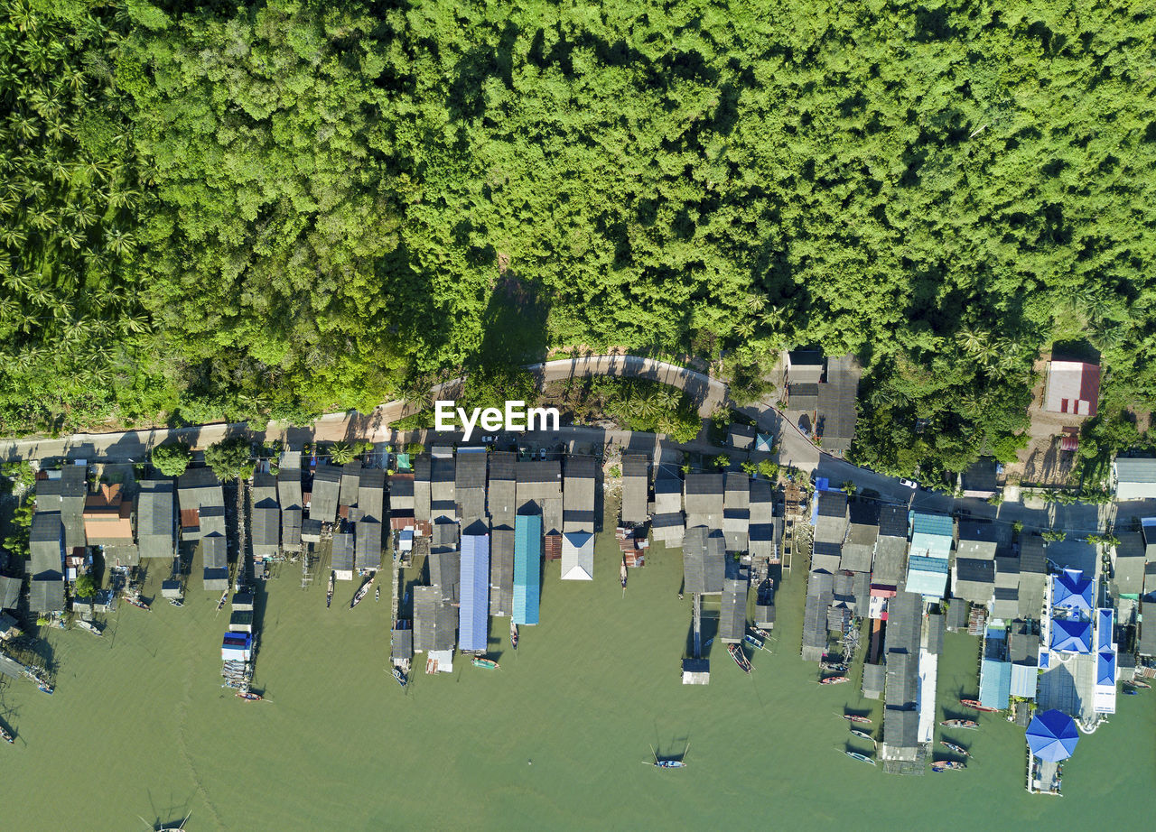 Top view aerial photo from flying drone of fishing village, chumporn, thailand, southeast asia. 