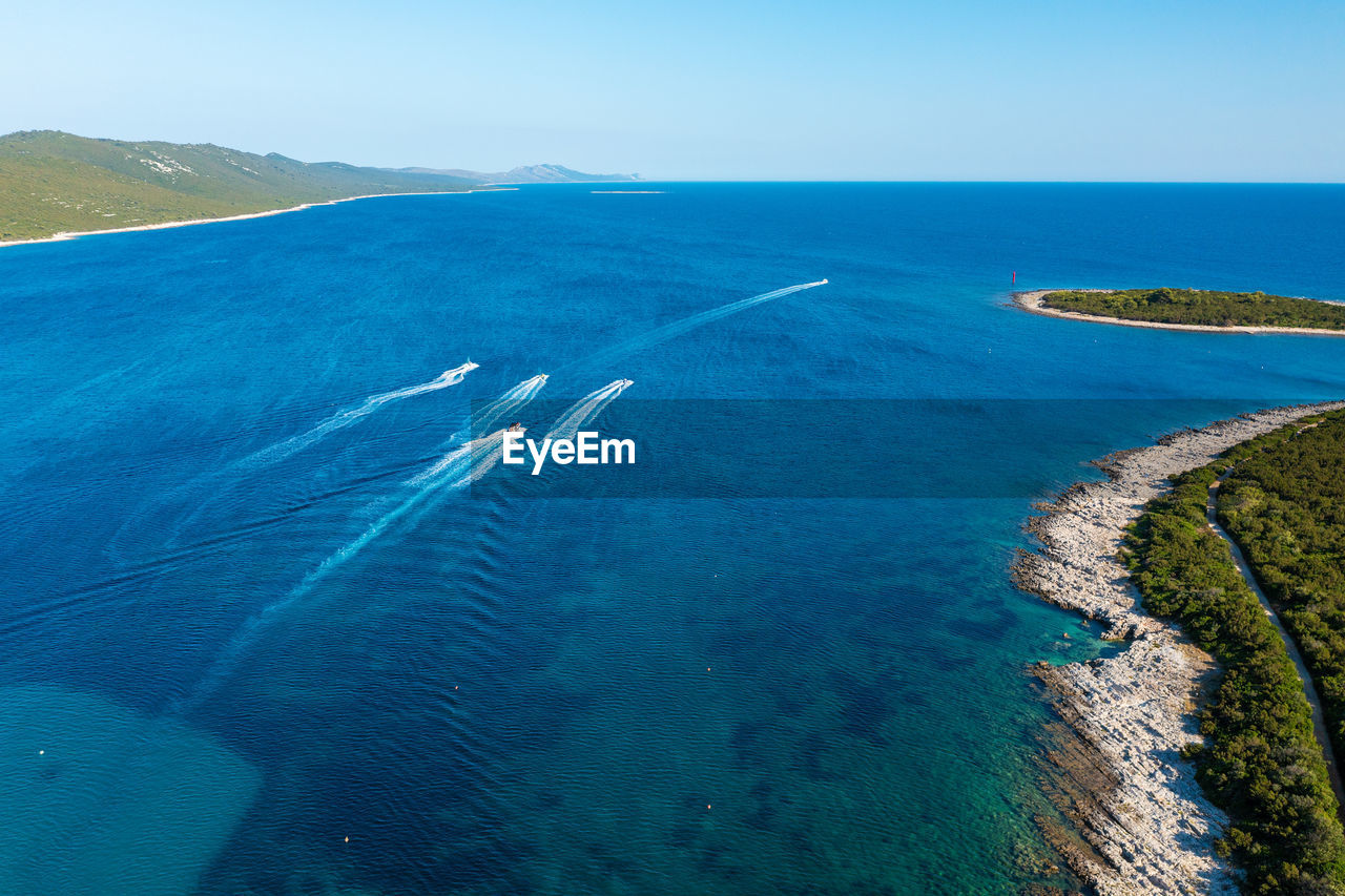 Aerial view of a beach with the boats on the sakarun beach, adriatic sea, croatia