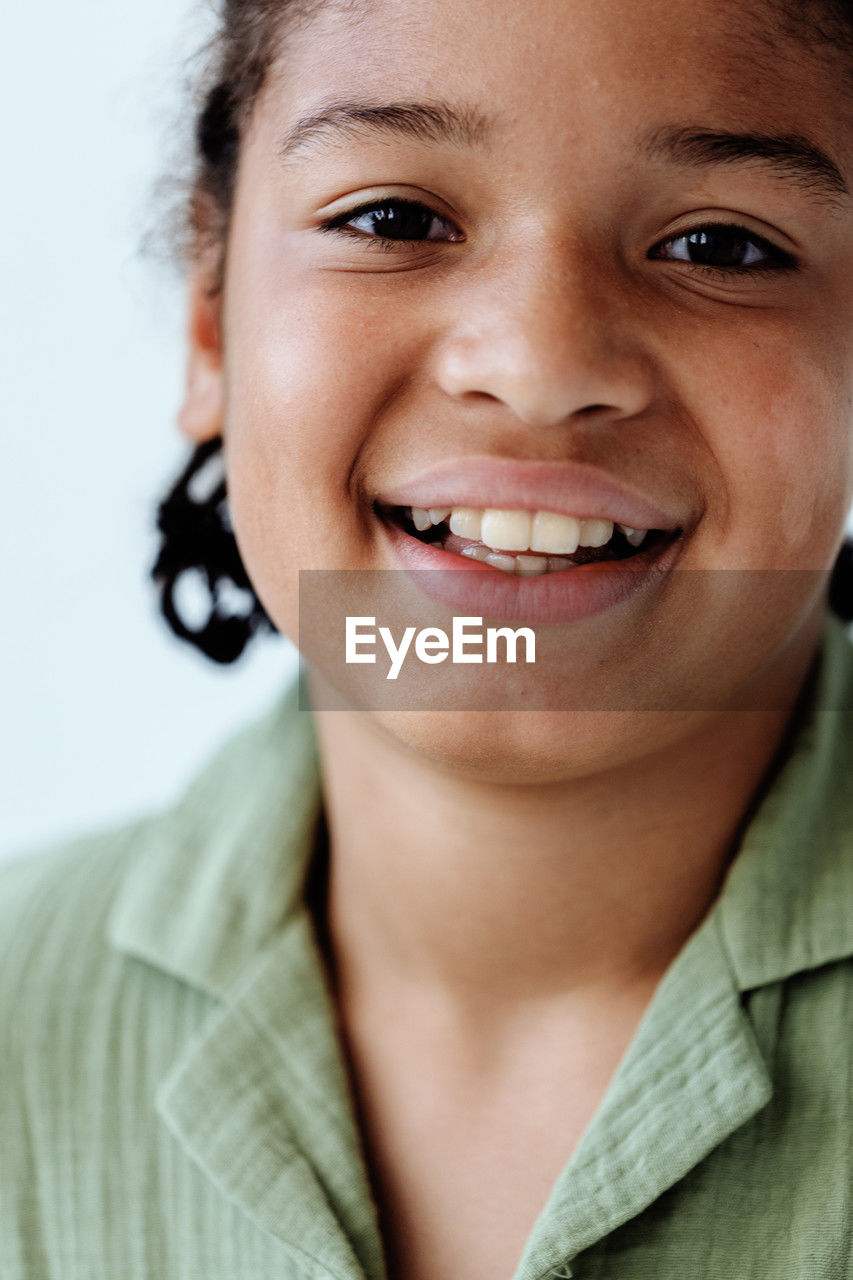 close-up portrait of smiling young woman