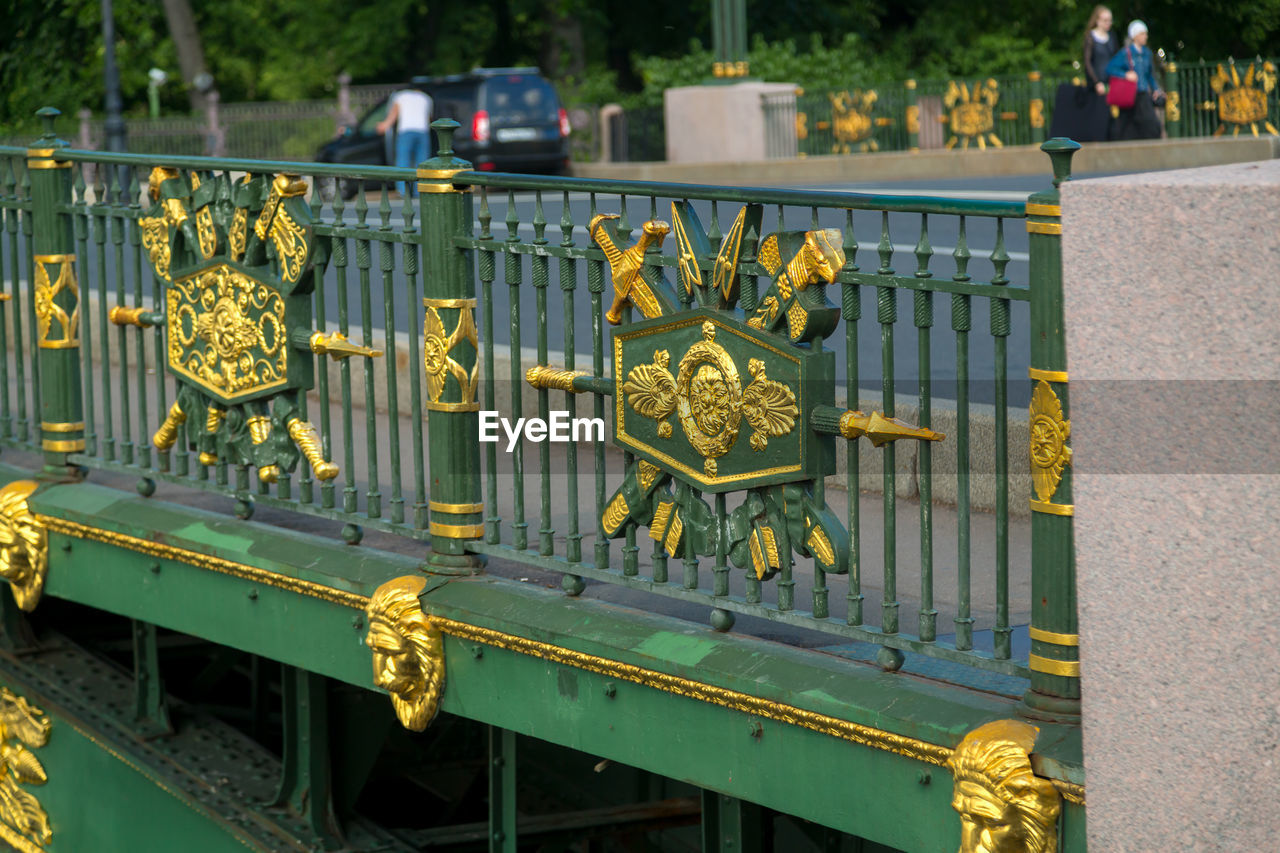 architecture, day, no people, outdoors, metal, railing, nature, vehicle, transportation, plant, yellow, gate