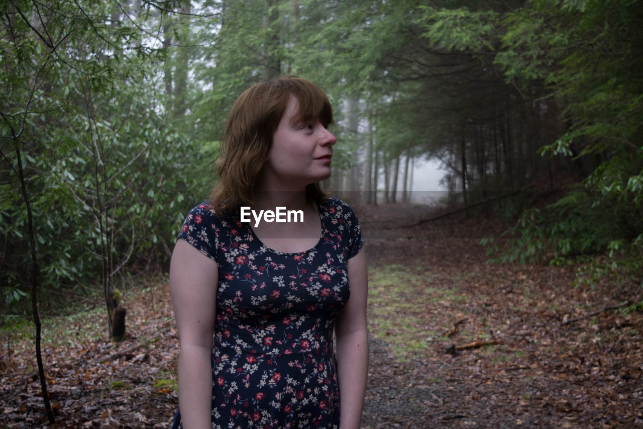 Young woman in forest