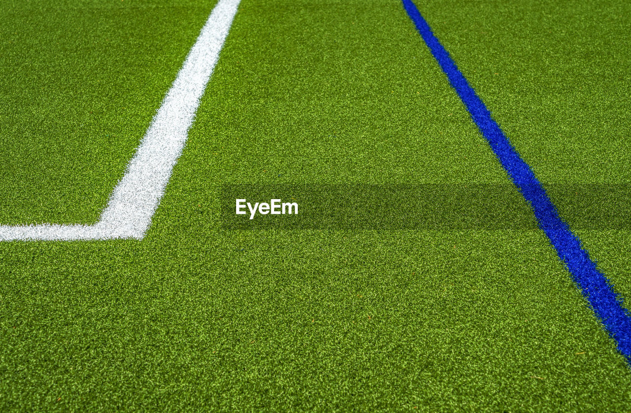 SCENIC VIEW OF SOCCER FIELD AND GREEN GRASS