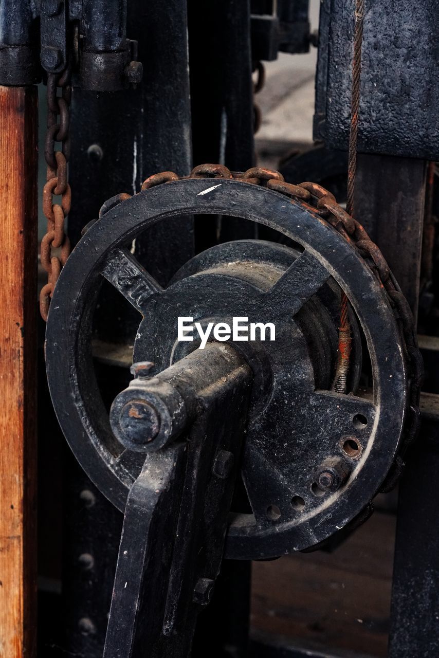 Close-up of chain pulley in church