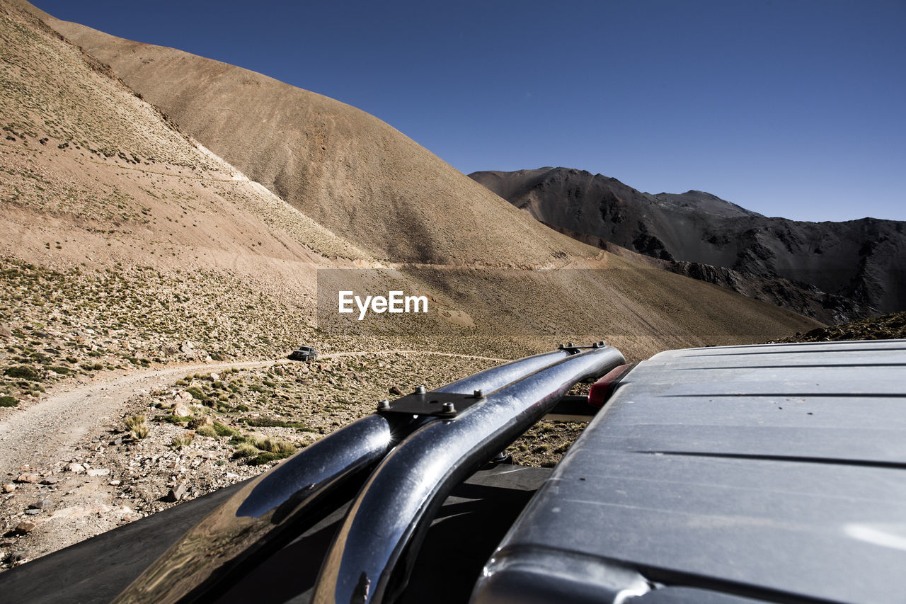 Car on road against clear sky