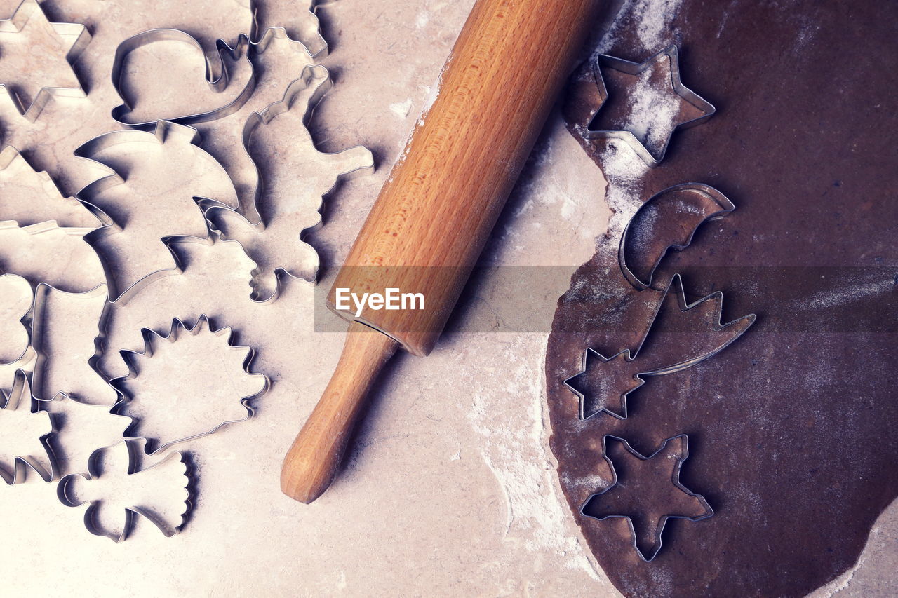 Preparation of christmas cookies at kitchen counter