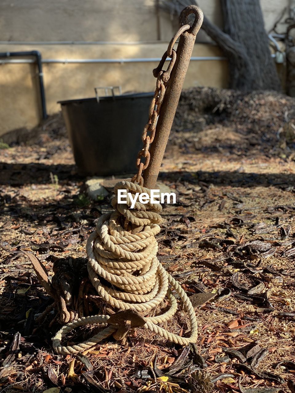 Close-up of rope tied on anchor