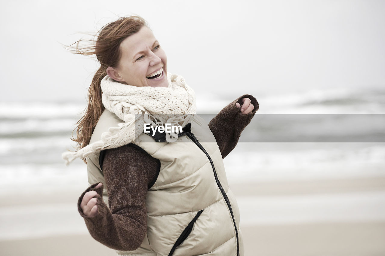 Happy woman on beach